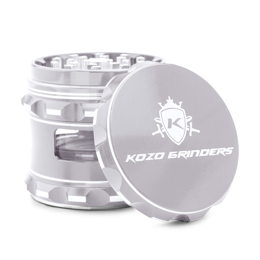Kozo 2.5 inch window grinder in silver, side viewing window with the lid tilted open to show the teeth