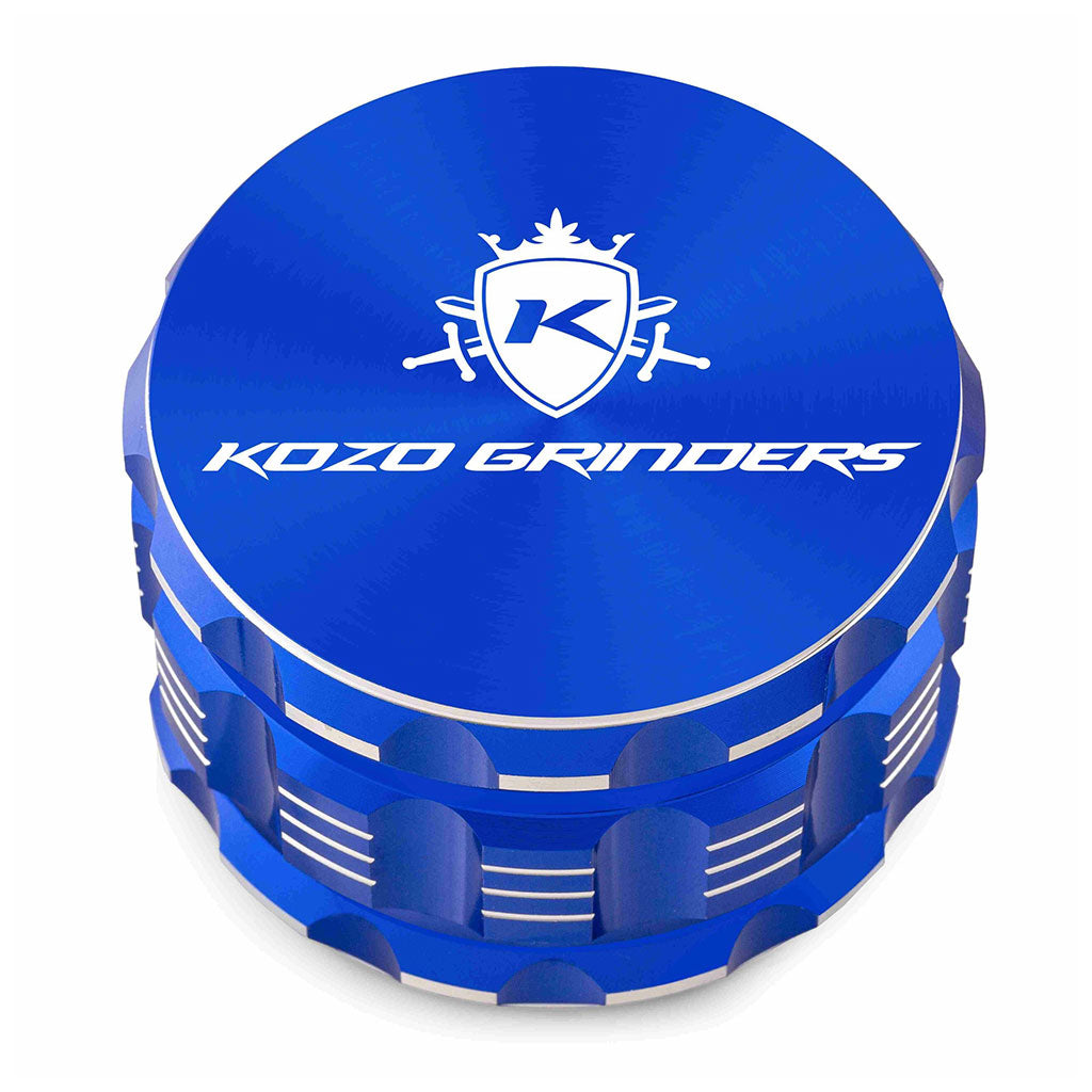 Kozo 3 inch four-piece anodized aluminum grinder in blue, closed front view of the body with the Kozo logo lid