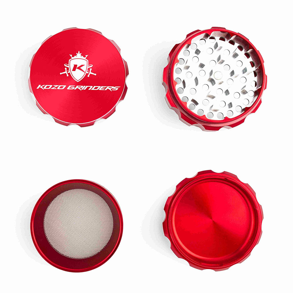 Kozo 3 inch four-piece anodized aluminum grinder in red, four pieces laid flat showing lid, teeth, screen and base