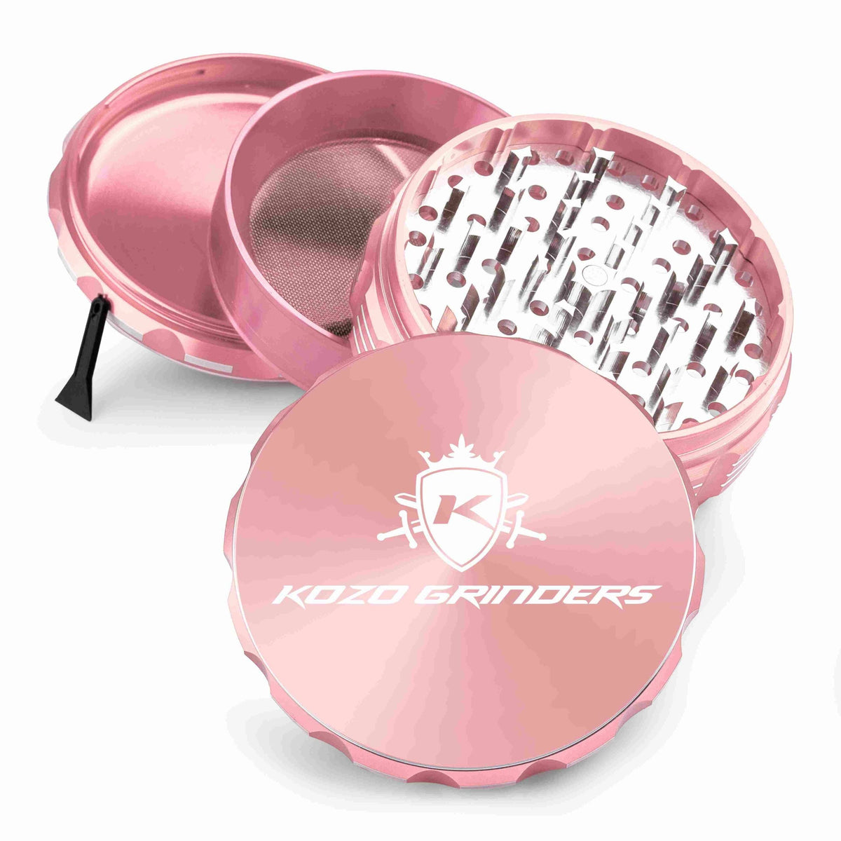 Kozo 4 inch four-piece anodized aluminum grinder in rose gold, split into four pieces with the pollen scraper