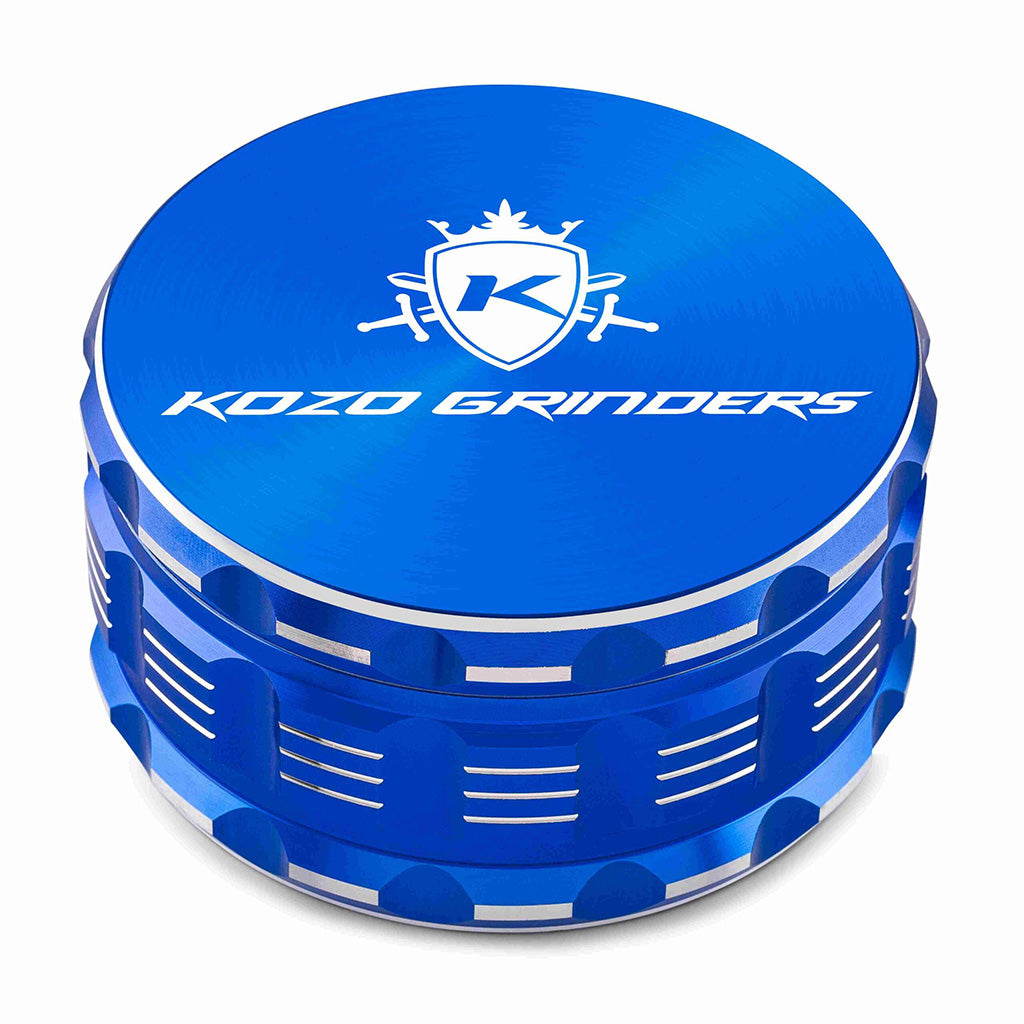 Kozo 4 inch four-piece anodized aluminum grinder in blue, closed front view of the body with the Kozo logo lid