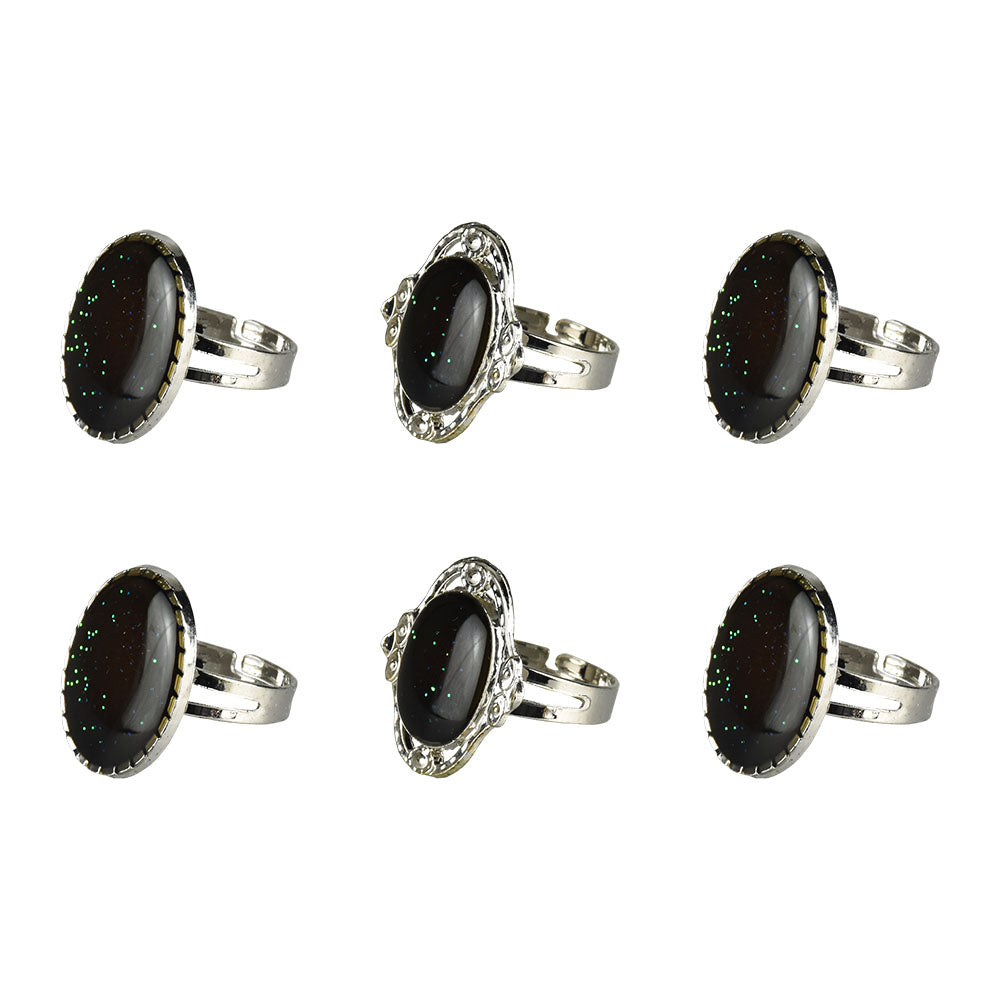 Assorted styles display of 60PC Oval Adjustable Mood Rings, top view on white background