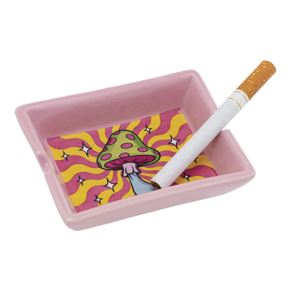 Fujima Cute'n'Punny Ceramic Ashtray with Psychedelic Mushroom Design, Angled View with Cigarette