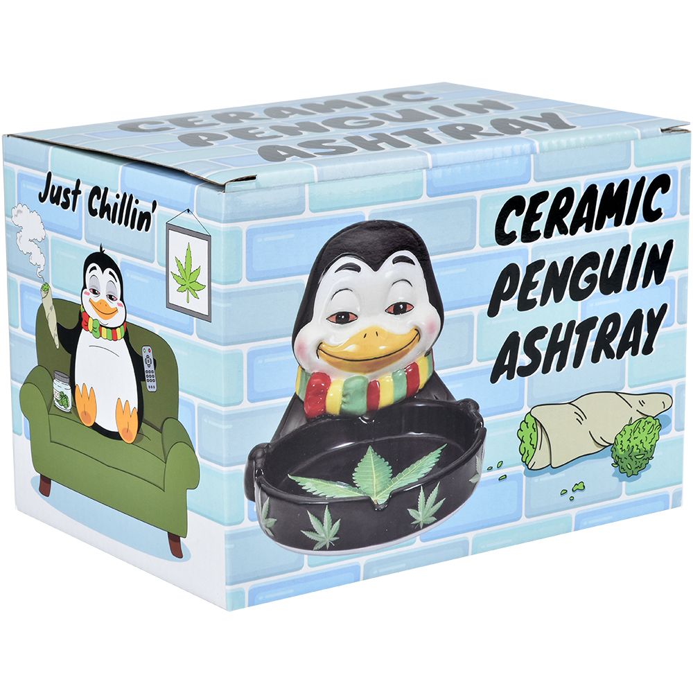 Stoned Penguin Ceramic Ashtray packaging, whimsical design with cartoon penguin, front view