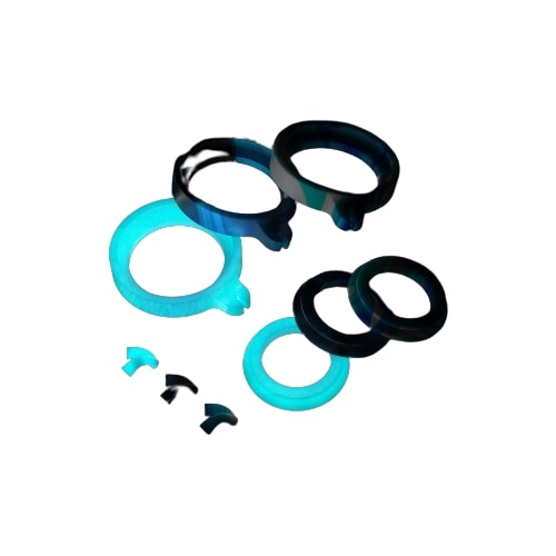 Dr. Dabber Switch Accessory Kit with glowing silicone carb cap seals and tweezer tips, top view