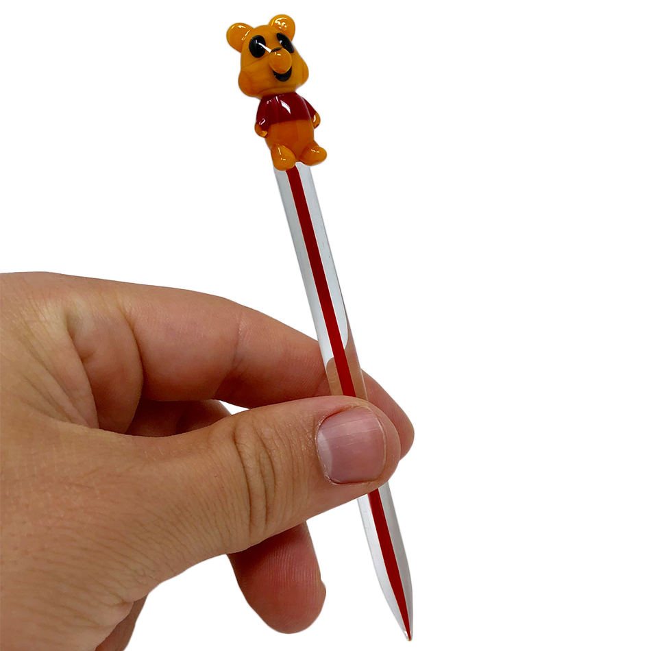AFM Bear Glass Dabber Tool held in hand, clear with colored accents, for precise dab rig use