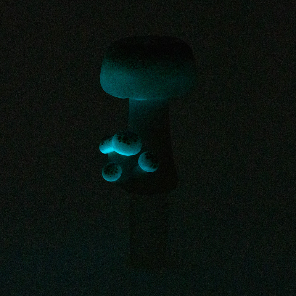 Empire Glassworks Funglow Bowl Piece glowing in dark, 14mm Borosilicate, angled view