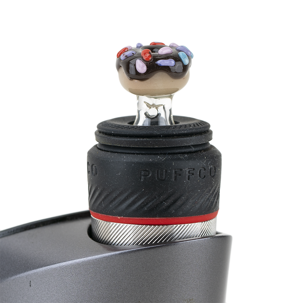 Empire Glassworks Donut PuffCo Peak Pro Glass Ball Cap, Close-Up on Black Background