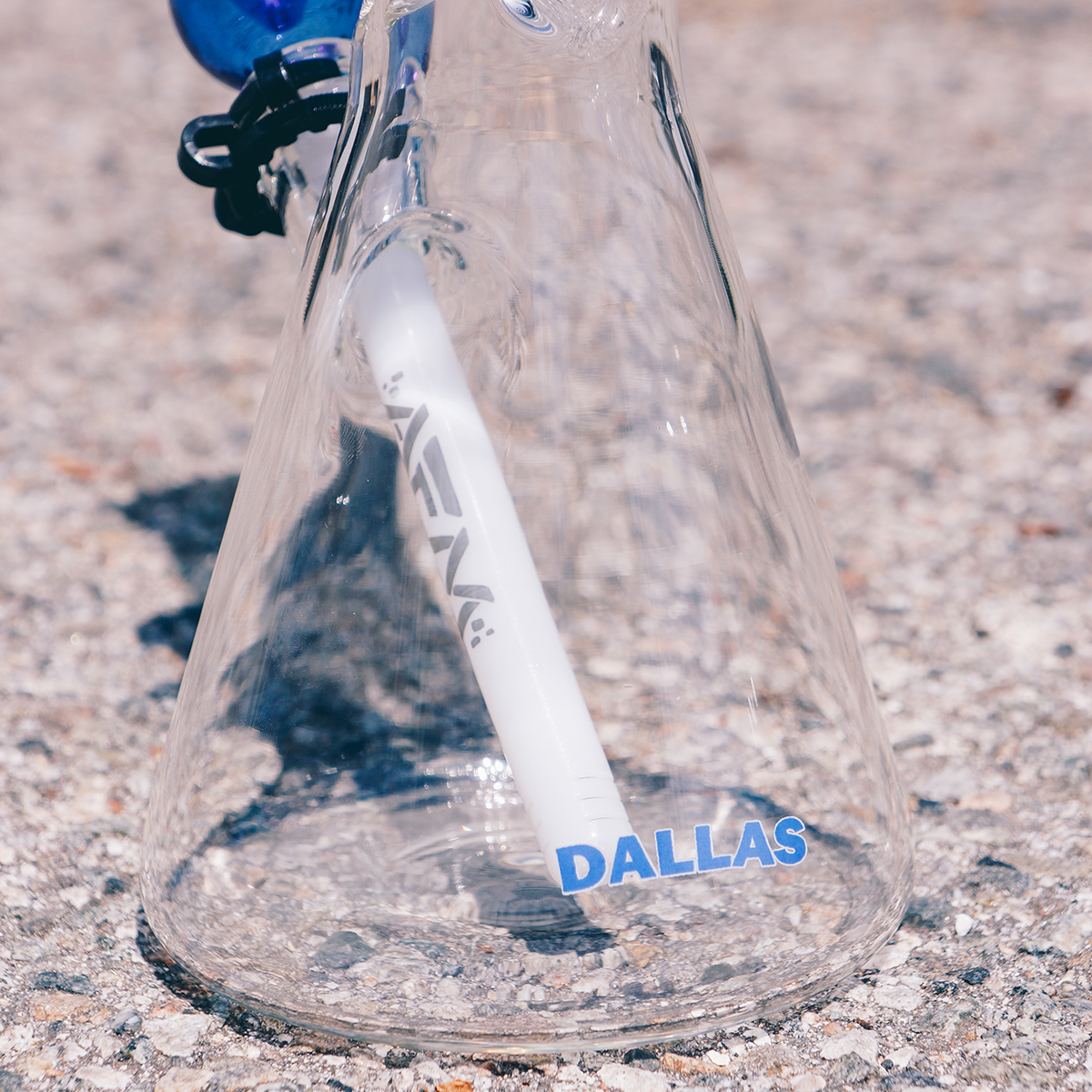 18" AFM Dallas Football Beaker Bong, 5mm thick borosilicate glass, ground view on concrete