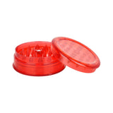 Pulsar Acrylic Grinder in red, 3-piece design, 2.25" diameter, open view showing teeth