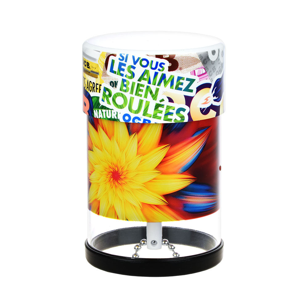 OCB x Wakit Electric Grinder with vibrant flower design, front view on white background