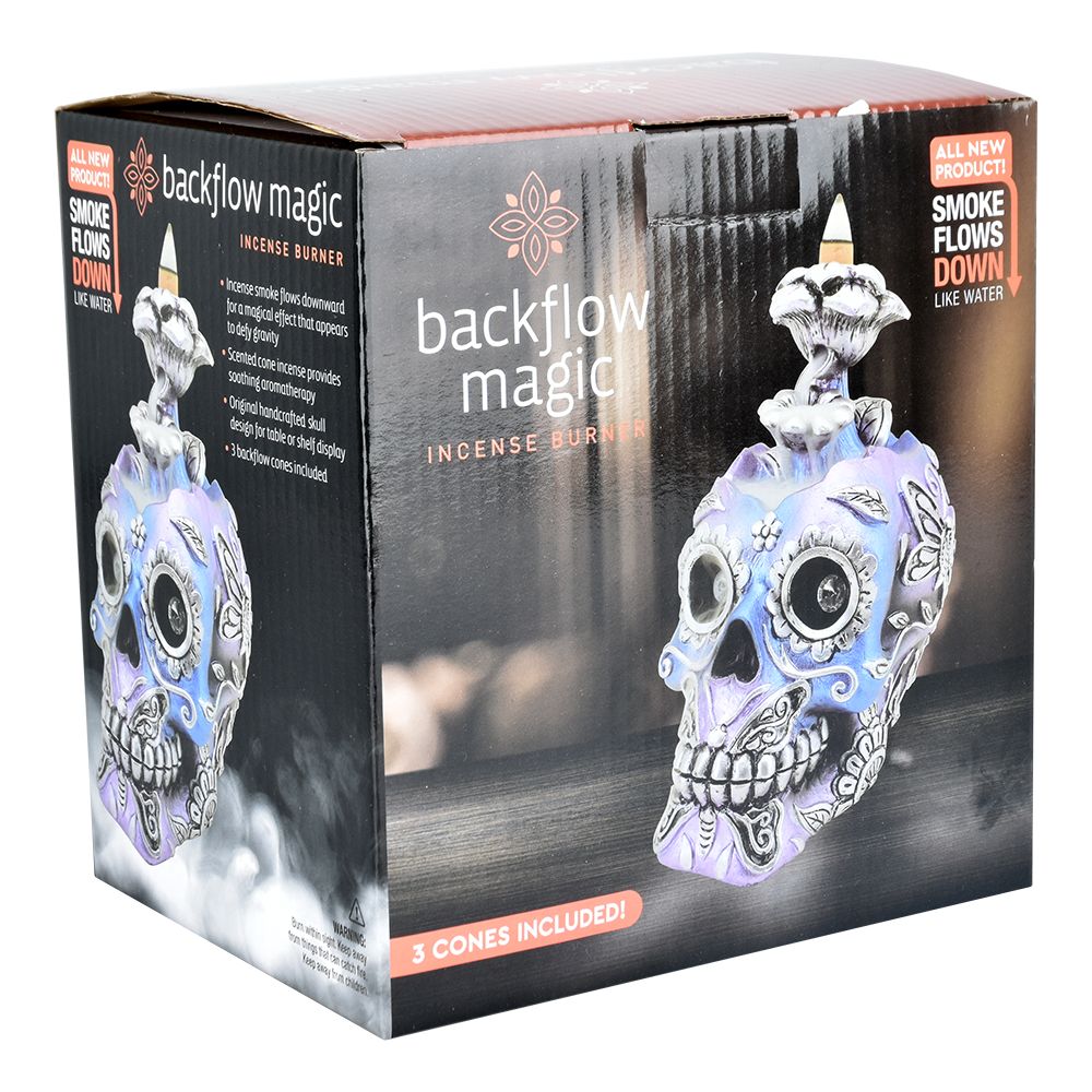 Electro Sugar Skull Back Flow Incense Burner with 3 cones, front view on seamless white background