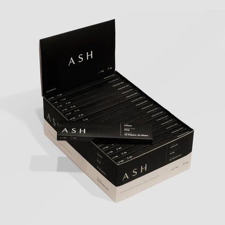 Ash King Size Classic Rolling Papers displayed in open box, designed for dry herbs, 32 pack