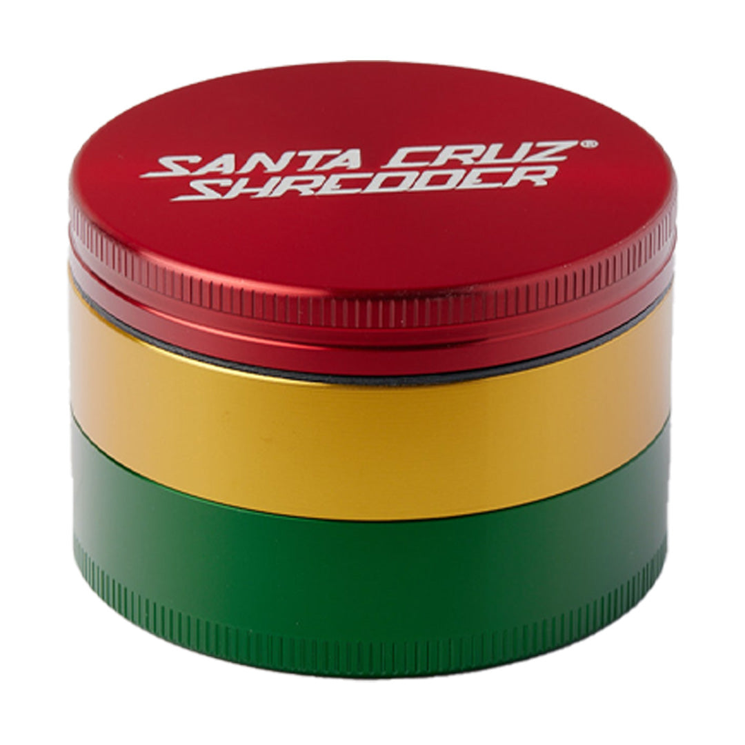 Santa Cruz Shredder Large 3-Piece Grinder in Rasta colors front view on white background