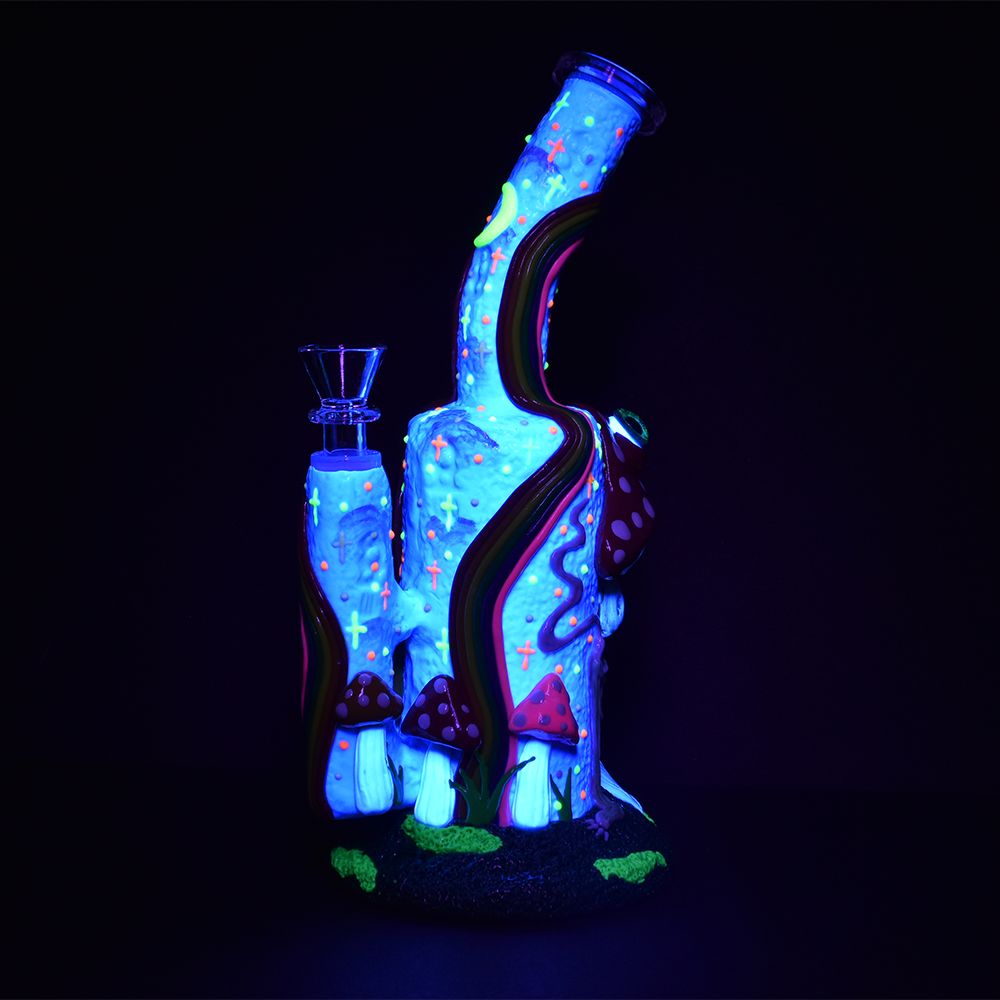 Glow in the dark water pipe with wide-eyed shroom and skeleton design, 9.5" tall, 14mm front view