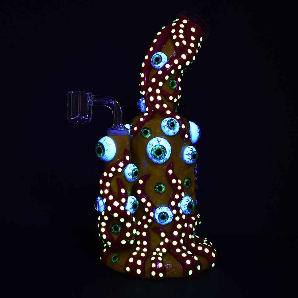 Glowing Octo Eyeballz Dab Rig with intricate eyeball design, 9.5" tall, 14mm female joint - front view