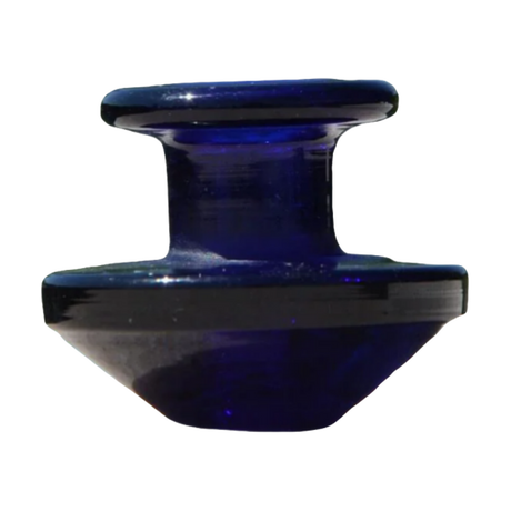Calibear Puffco Peak Carb Cap in blue glass, front view on a seamless white background, compact design for dab rigs.