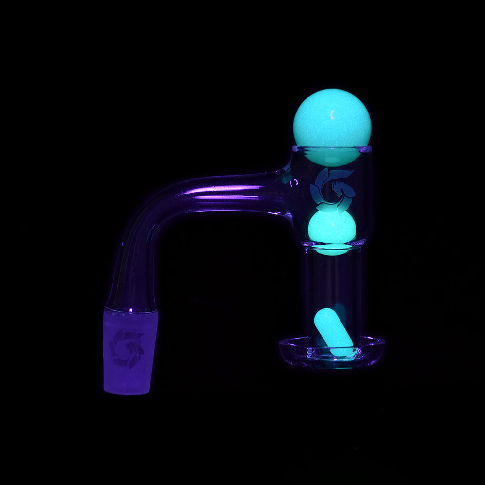 Glass House Mini Terp Vacuum Banger Kit glowing in dark, 14mm Male 90 Degree angle