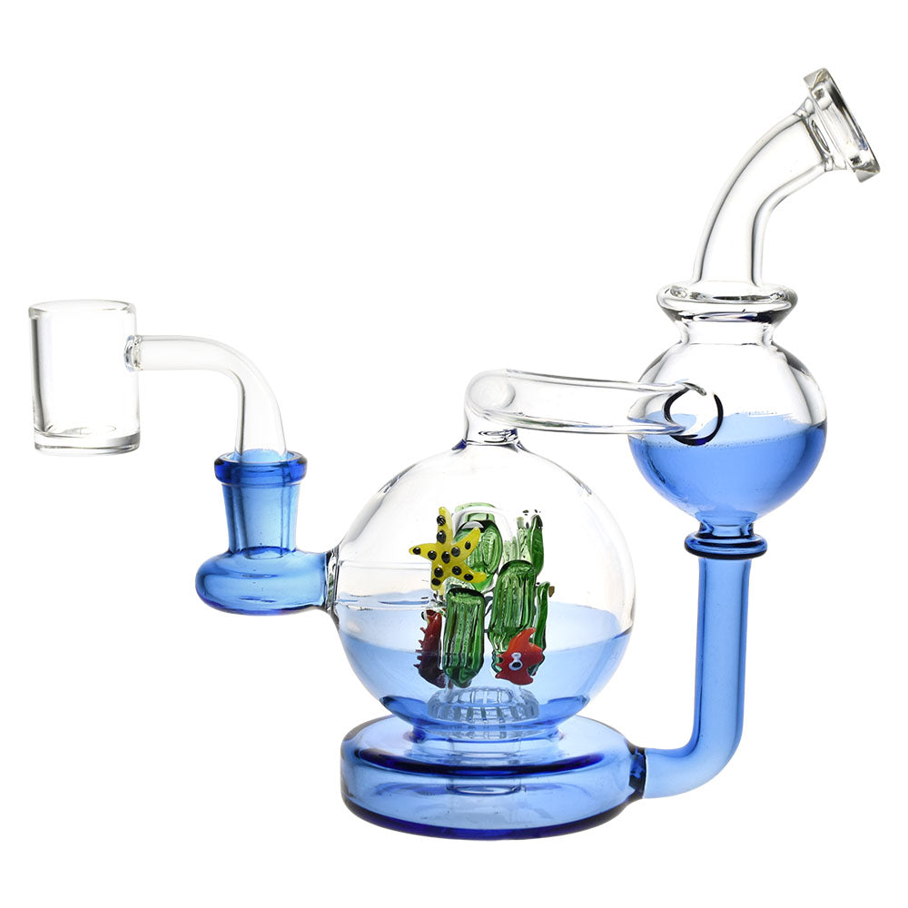 Pulsar Sea Globe Recycler Dab Rig in blue with intricate cactus design, 7" 14mm female joint