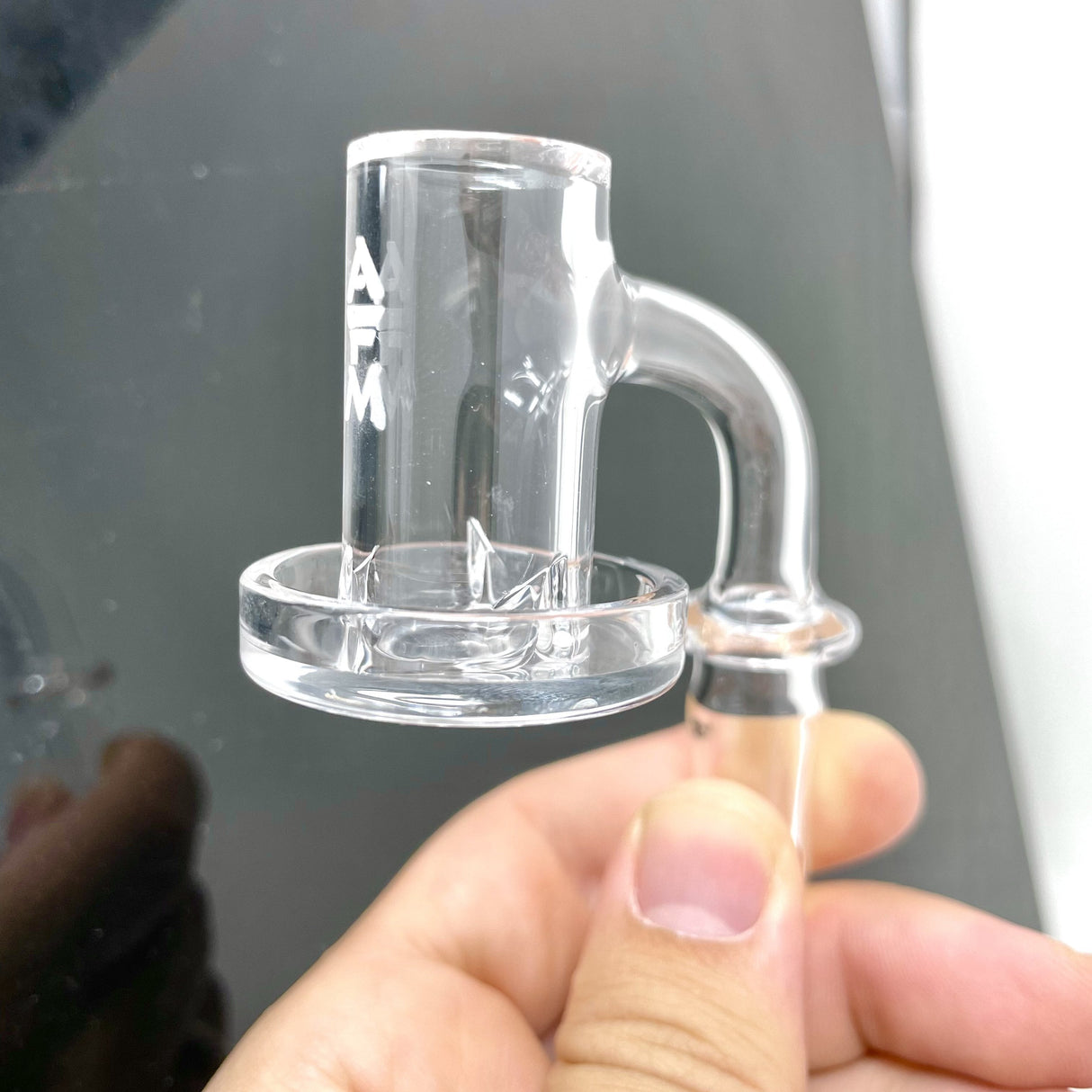 AFM Terp Dish Banger held in hand, clear quartz, 45-degree joint angle, heavy wall thickness