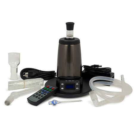 Arizer Extreme Q Dry Herb Desktop Vaporizer with accessories and remote control, front view on white background