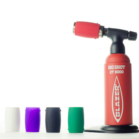 Blazer Silicone Nozzle Guards in assorted colors displayed next to a red Blazer torch