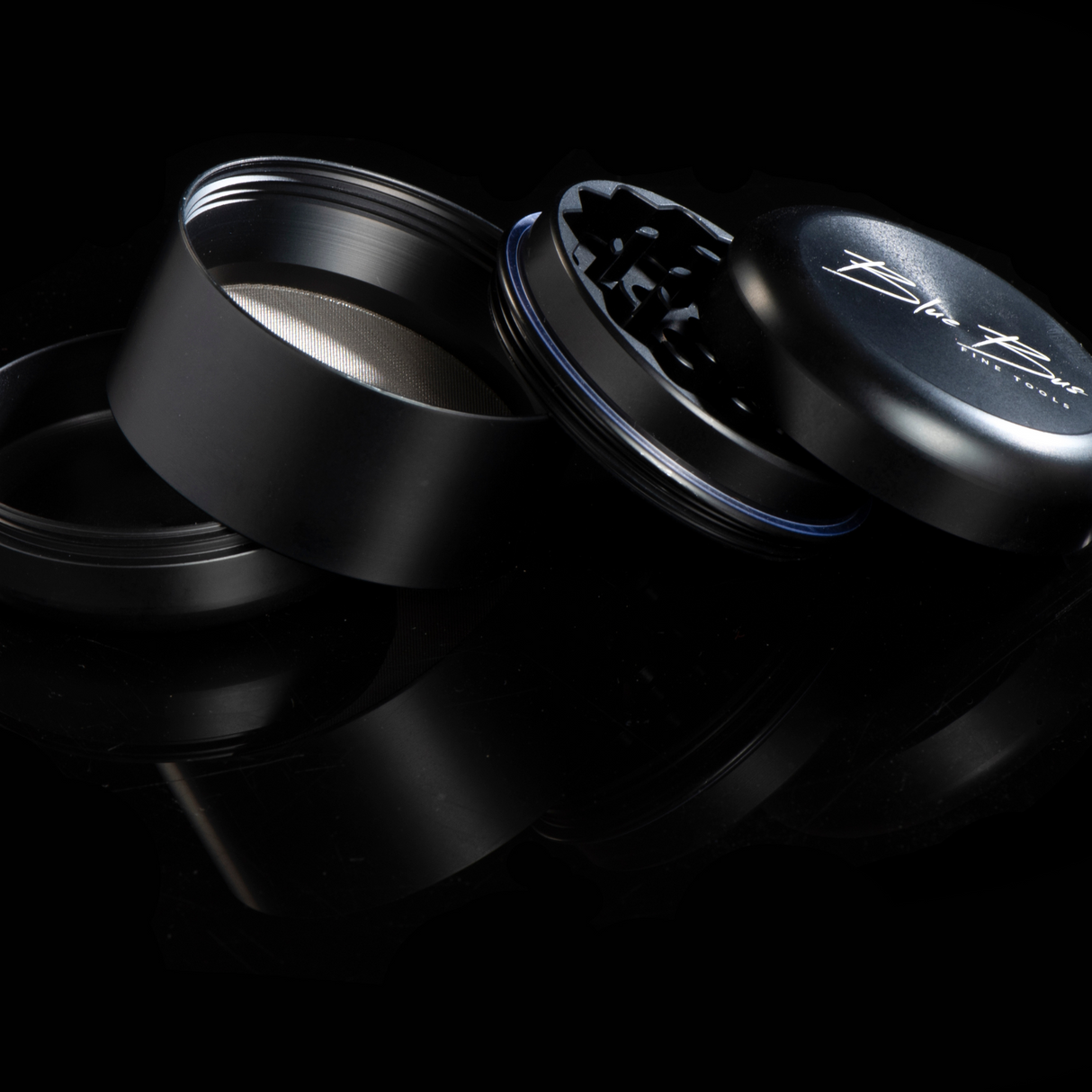 BLUEBUS 4 Piece 2.2" Aluminum Grinder for Dry Herbs, Magnetic - Open View on Black Background