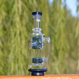 Calibear Straight Fab Carta Attachment in clear glass with blue accents, outdoor side view