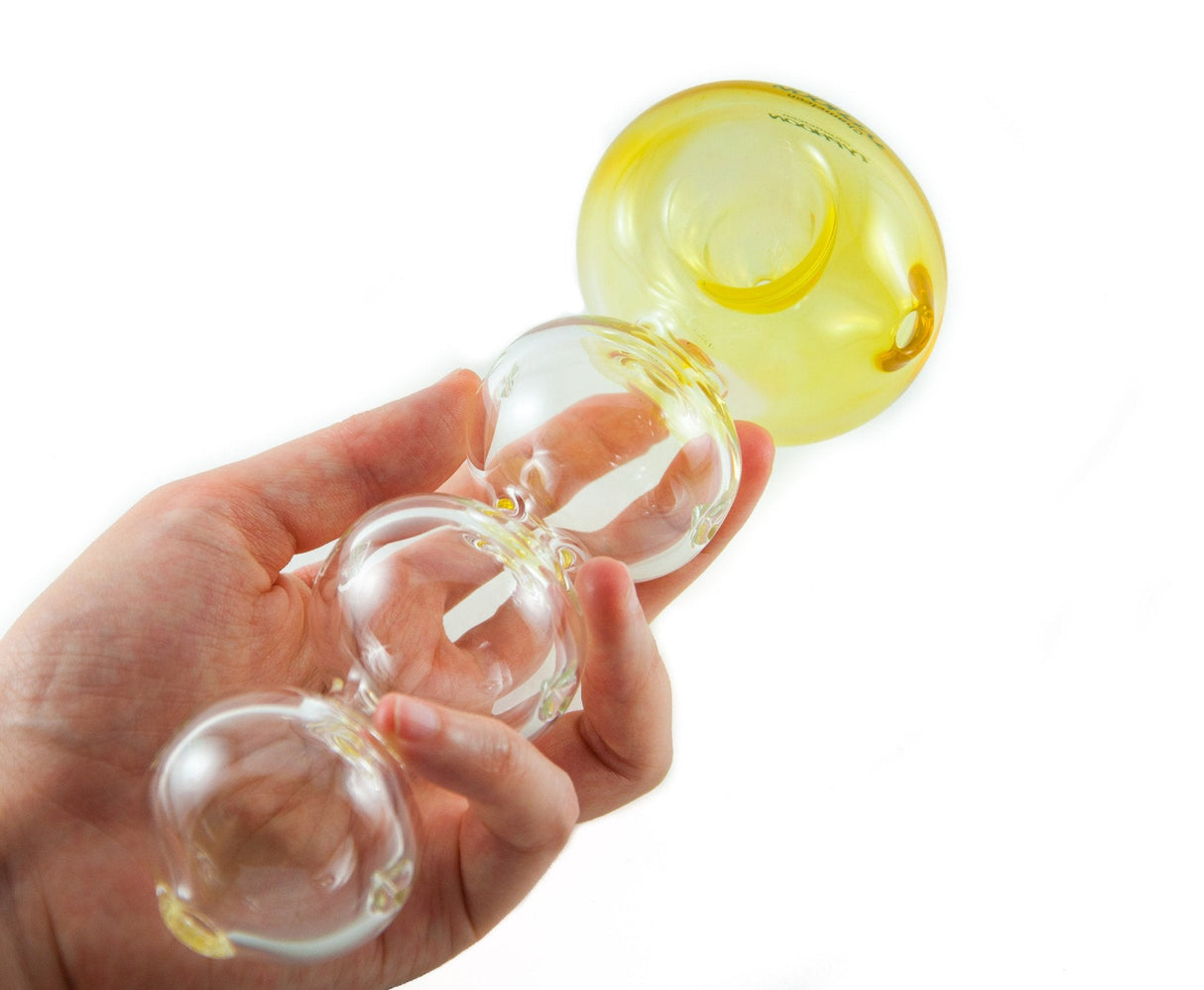 Chameleon Glass Typhoon Classic hand pipe with vortex percolator, held in hand against white background