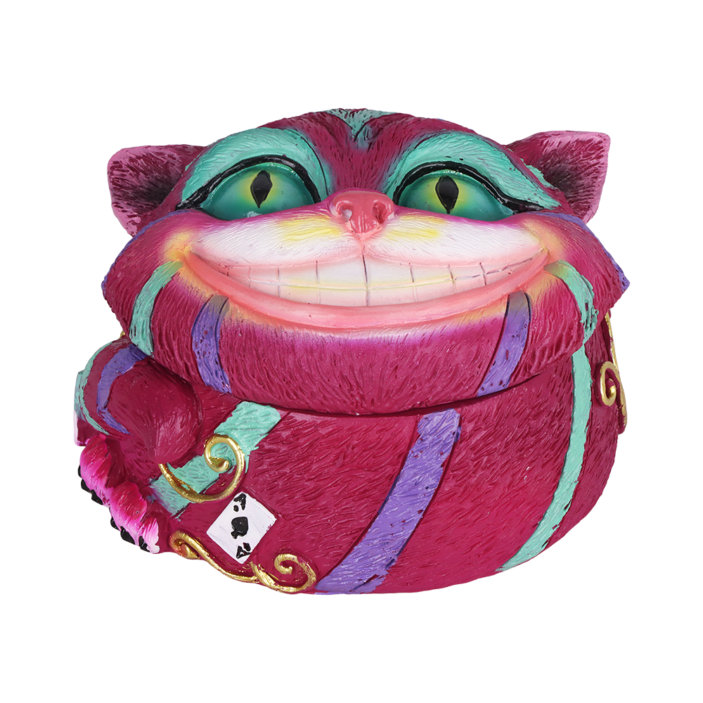 Cheshire polyresin stash jar 2.5 inch in purple, a small container with a grinning cat face on the lid