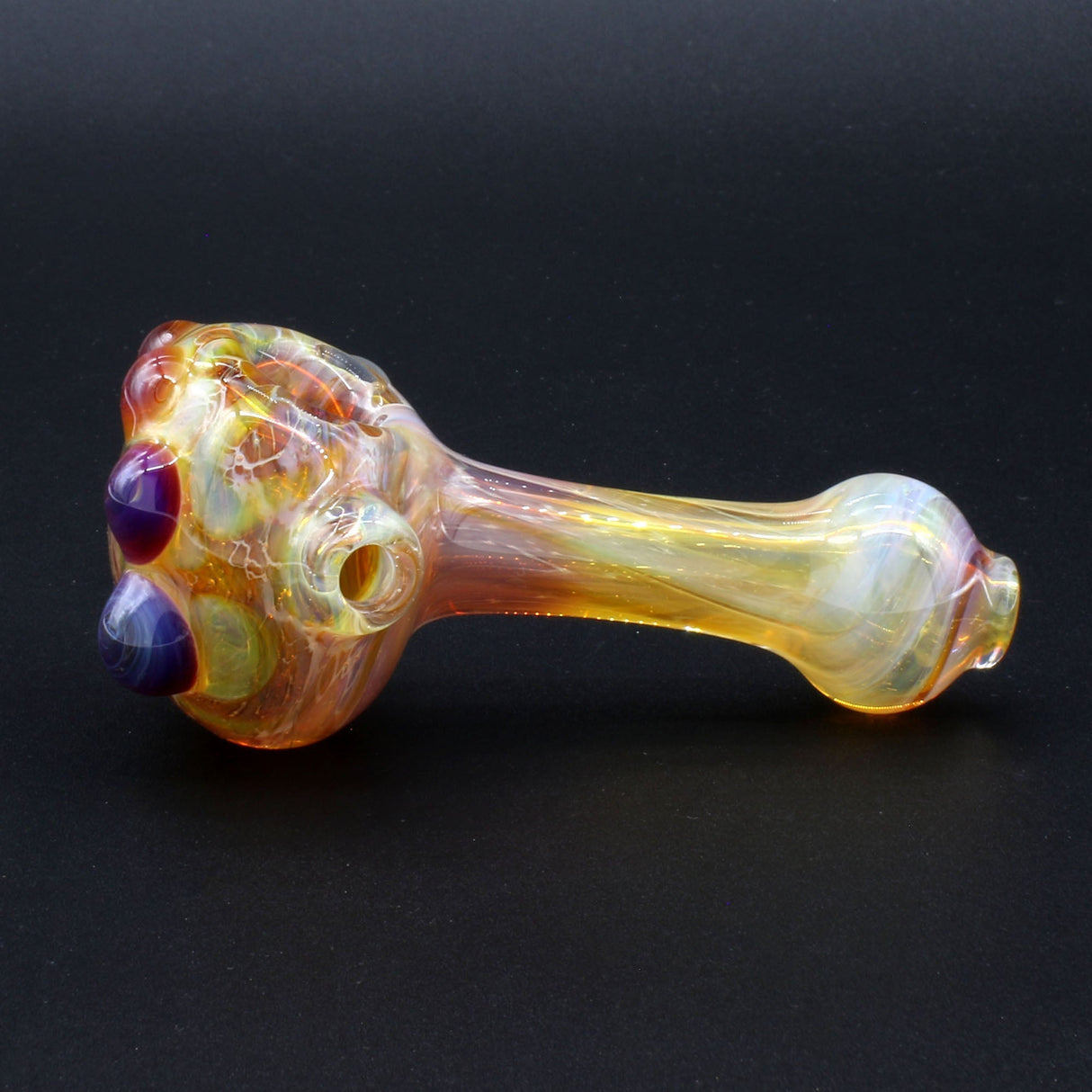 Clayball Glass "Amber Flame Nebula" Heady Spoon Hand-Pipe with intricate color design on black background