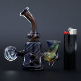 Clayball Glass "Black Moon" Heady Sherlock Dab Rig with deep bowl, side view next to lighter