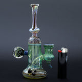 Clayball Glass "Enclave Nebula" Heady Sherlock Dab-Rig with intricate design, front view next to lighter