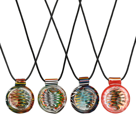 Assorted colorful Waking Dream glass pendant necklaces on a white background