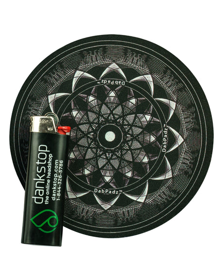 DabPadz 5" Black Lotus Rubber Dropmat with dankstop lighter, top view on white background