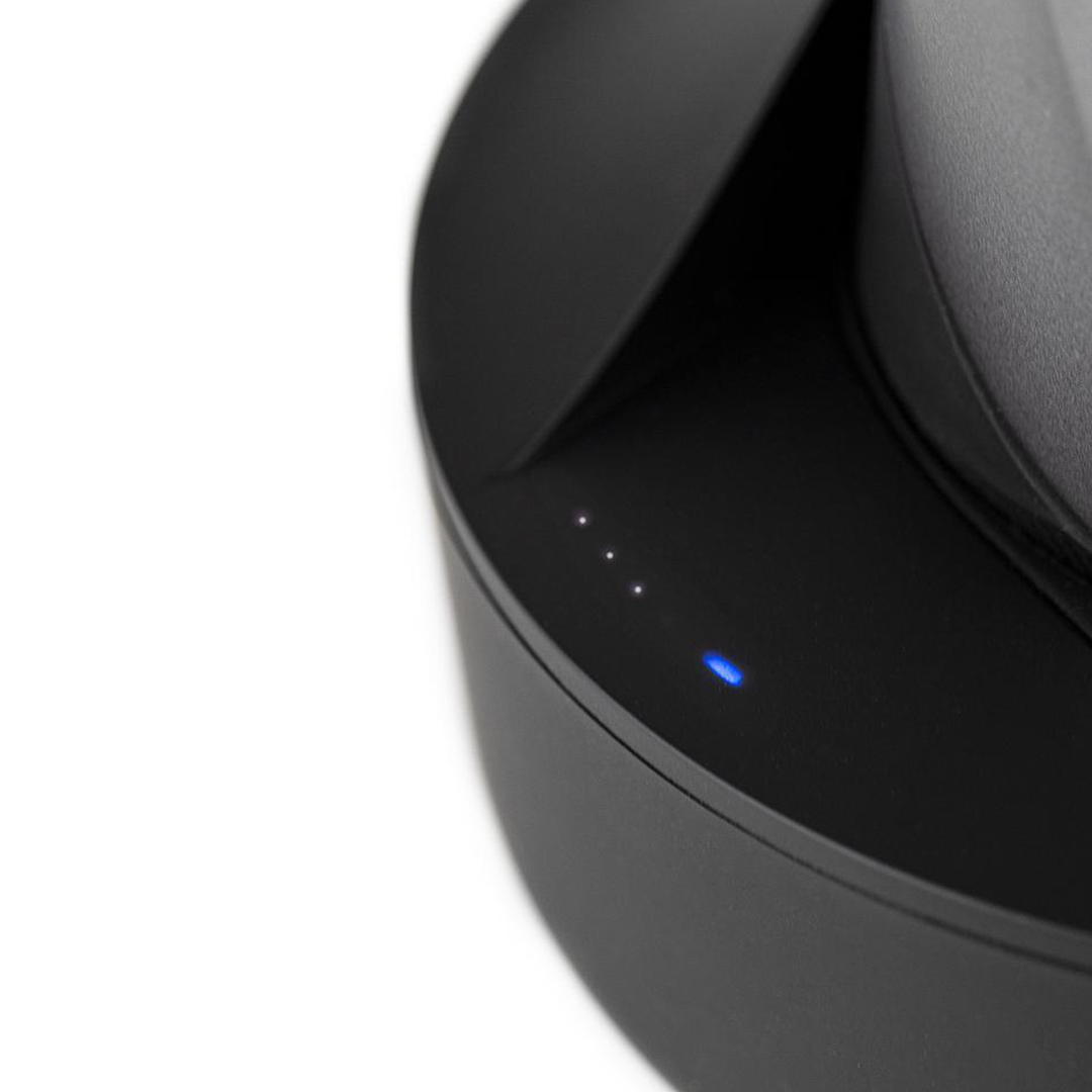 Puffco Peak Pro Power Dock close-up, black, with LED indicators lit