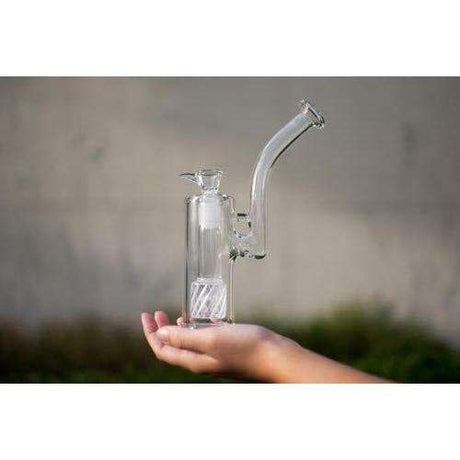 1Stop Glass Upright Bubbler with Perc, clear with blue accents, held in hand showing portability