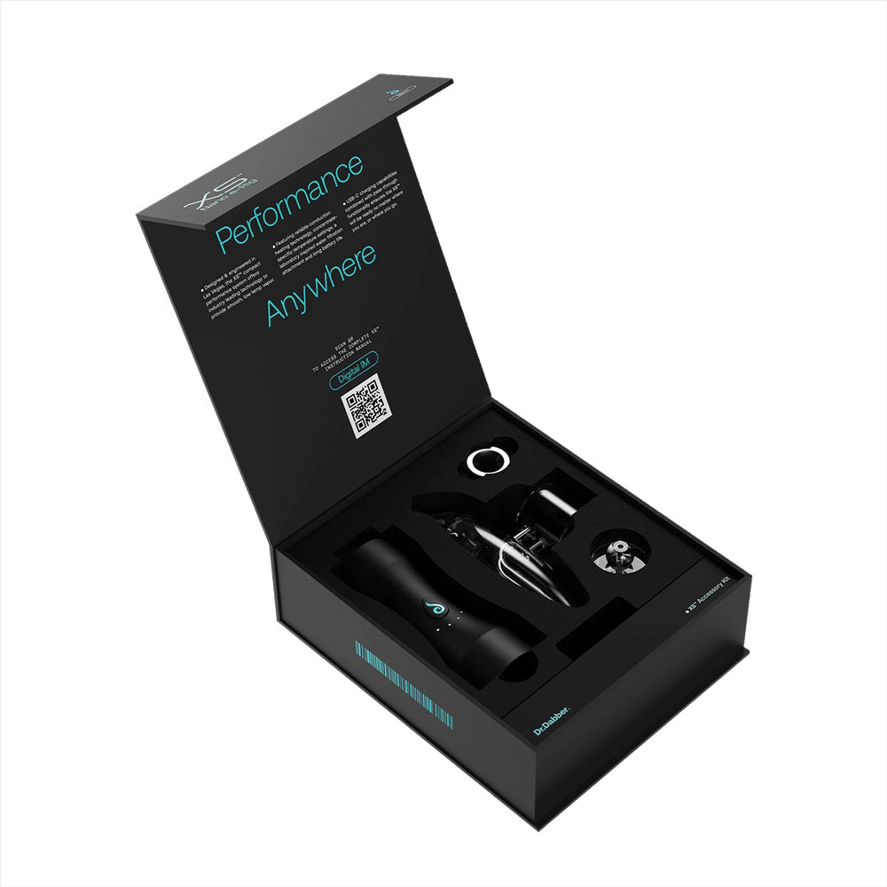 Dr. Dabber XS Vaporizer in open box showcasing the device and accessories, angled view