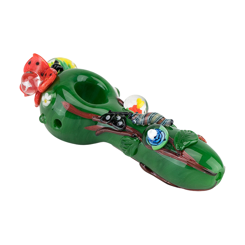 Empire Glassworks Spoon Pipe featuring colorful garden critters on green borosilicate glass, side view.