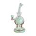 Calibear Jade Green EXOSPHERE Dab Rig with Seed of Life Perc, 14mm Joint, Side View on Wooden Surface