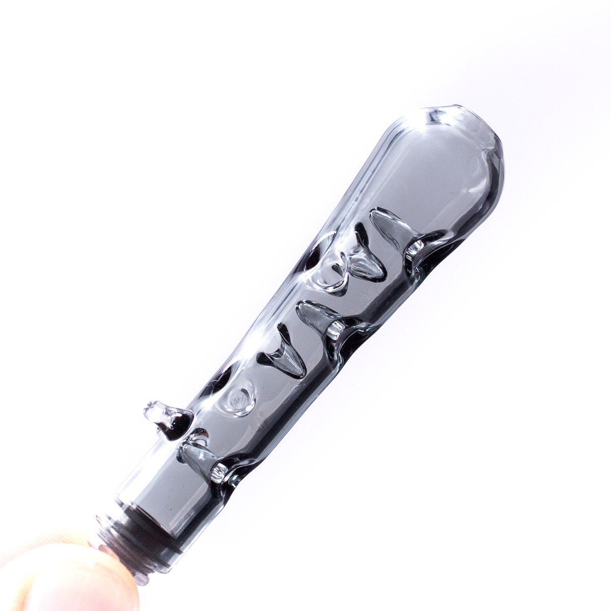 Close-up of Fat Bottom Glass Stem for DynaVap by The Stash Shack held in hand