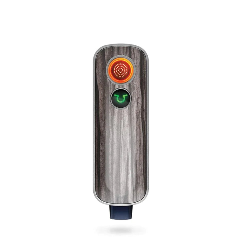 Firefly 2+ Plus Vaporizer with glowing heat indicator, sleek portable design for herbs