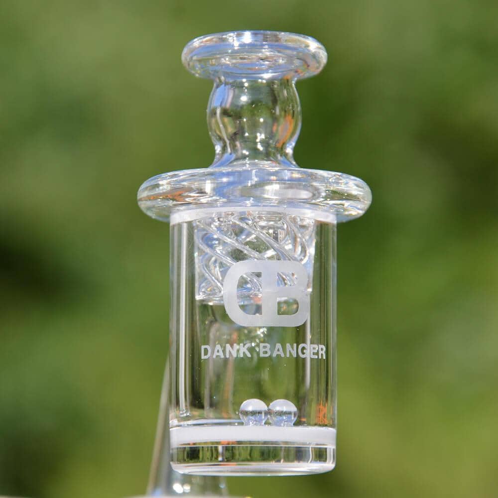 DANK BANGER Hybrid Banger Set with Spinning Cap & Terp Pearls, clear borosilicate glass, outdoor background