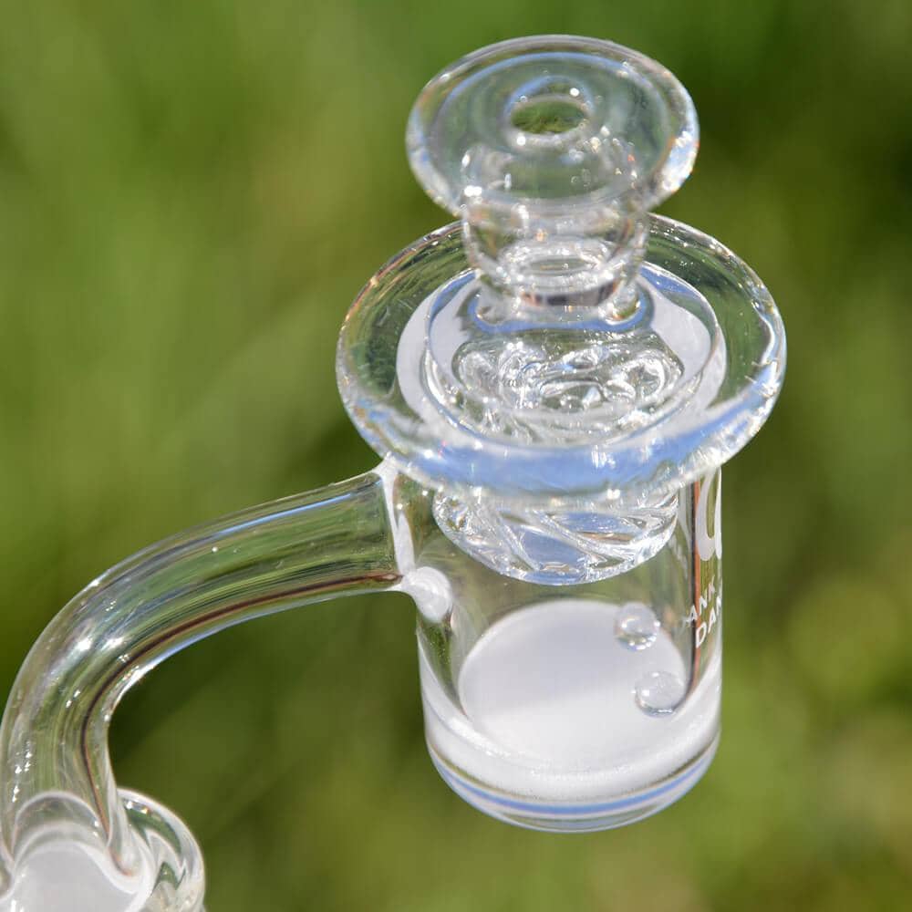 DANK BANGER Hybrid Banger Set with Spinning Cap & Terp Pearls on Grass Background