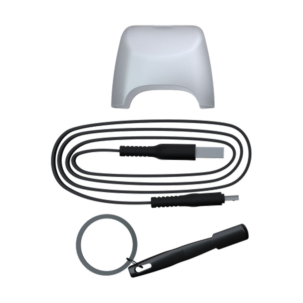 G Pen Dash+ Dry Herb Vaporizer accessories, including USB cable and keychain tool, on white