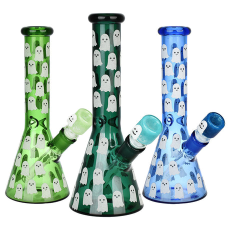 Ghostly Glow Beaker Water Pipes in green, black, and blue with ghost designs, 10-inch height, 14mm female joint, front view