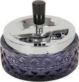 Borosilicate glass spinning ashtray with intricate design, 4.75" size, ideal for rolling accessories.