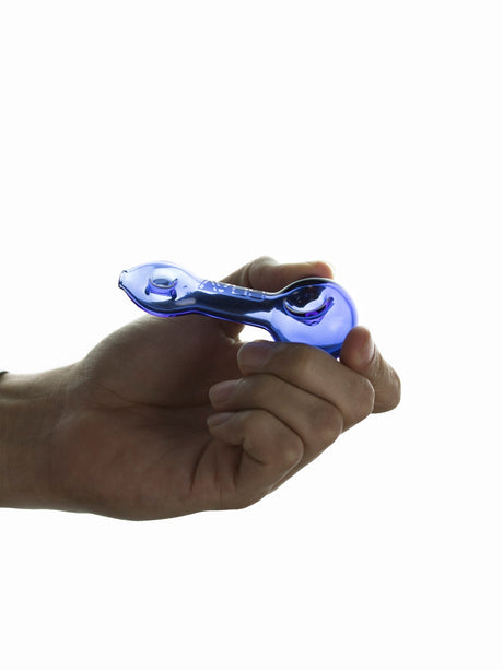 Hand holding GRAV Mini Spoon Pipe in Blue, compact 3" borosilicate glass, side view