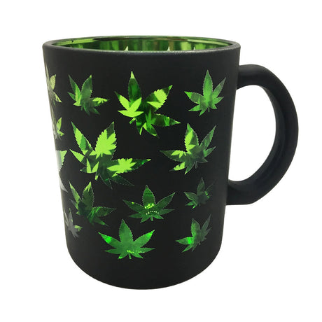 Black 16oz coffee mug with metallic green hemp leaf design, made of ceramic, front view on white background