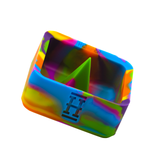 Hemper Silicone Caché Ashtray in vibrant tie-dye pattern, durable debowling feature, angled view